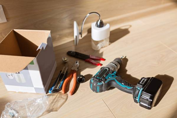 Tools for minor repairs on the wooden floor. DIY accessories ready to go. board, building, claw, closeup, construction, equipment